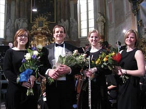 BG orchestra director Elizabeth Bennett, Ed Jacobi, student teacher Emma Burrows of the University of Illinois, and BG choir director Debora Utley after a concert at the Church of St. Simon and St. Jude in Prague, March, 2010.
